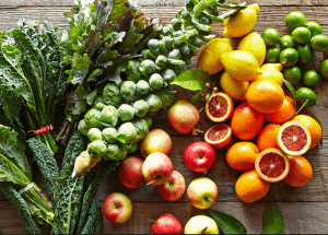a group of fruits and vegetables on a wood surface Healthy Weight Loss Diets Canvey Island